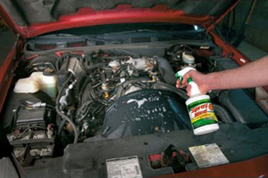 Spray Nine cleaner and disinfectant used to degrease a car engine